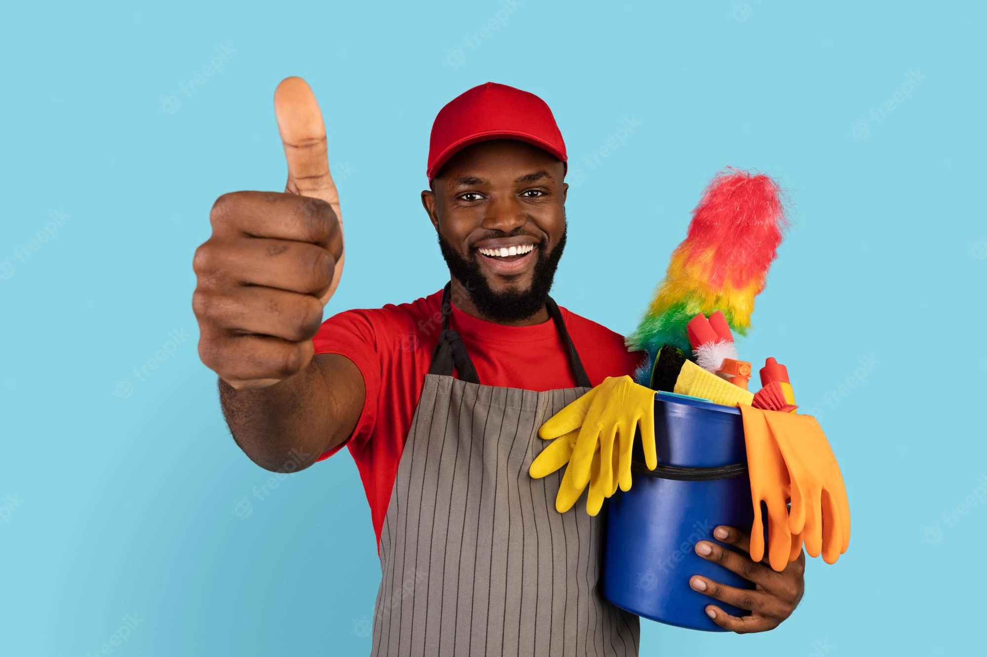 cleaning-services-black-cleaner-man-holding-basket-with-detergents-gesturing-thumb-up_116547-17596